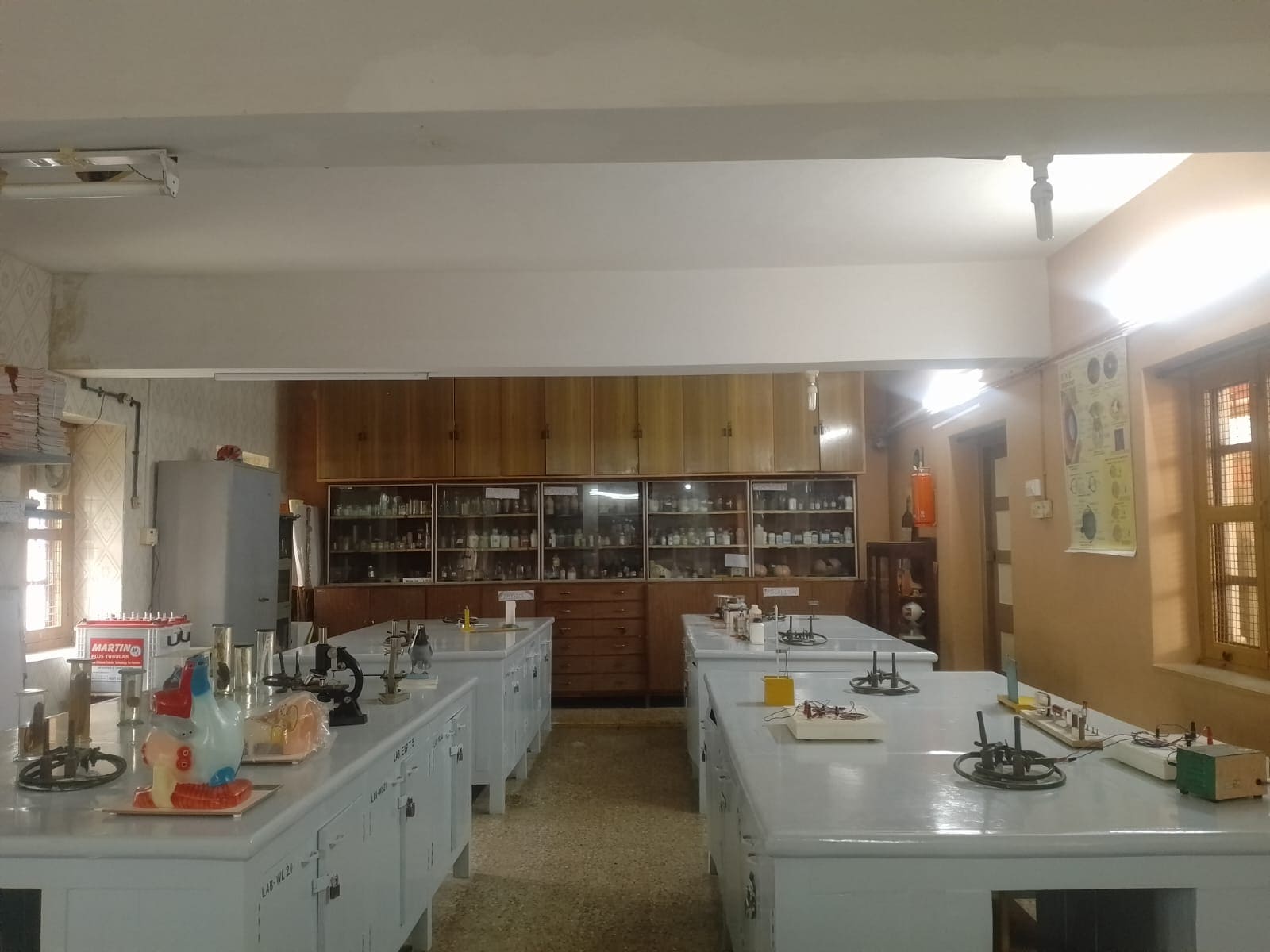 Students performing experiments in school science lab