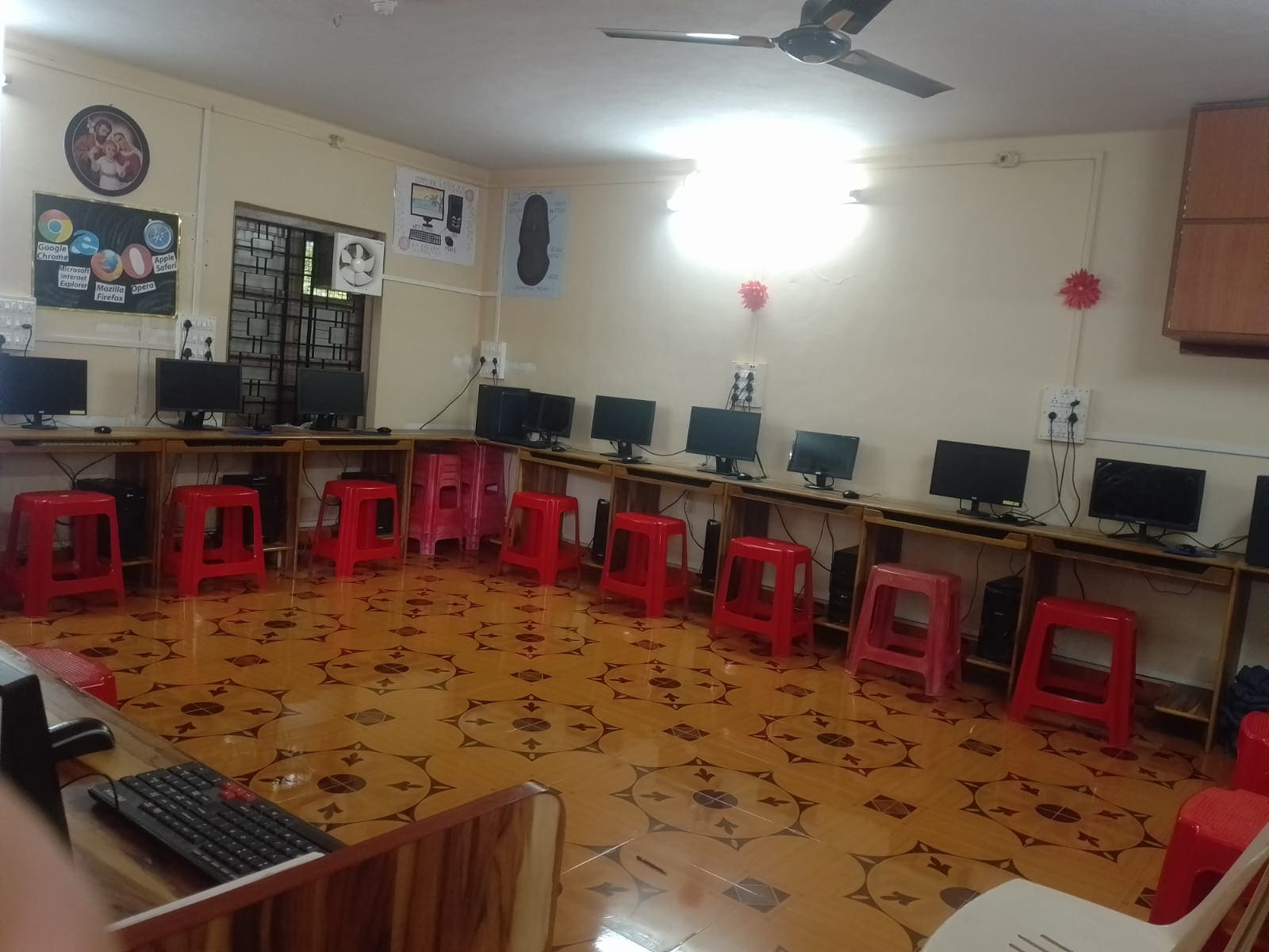 Students learning computers in modern computer lab